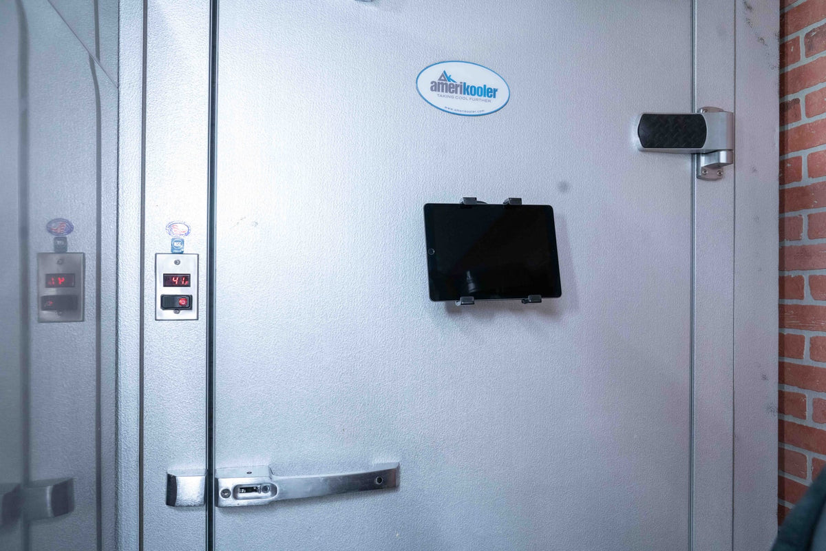 iBOLT device mounting setup in a restaurant workspace