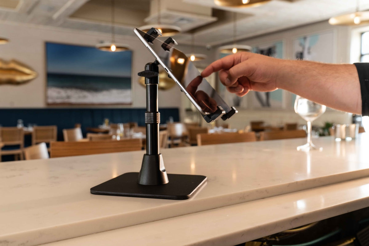 iBOLT device mounting setup in a restaurant workspace