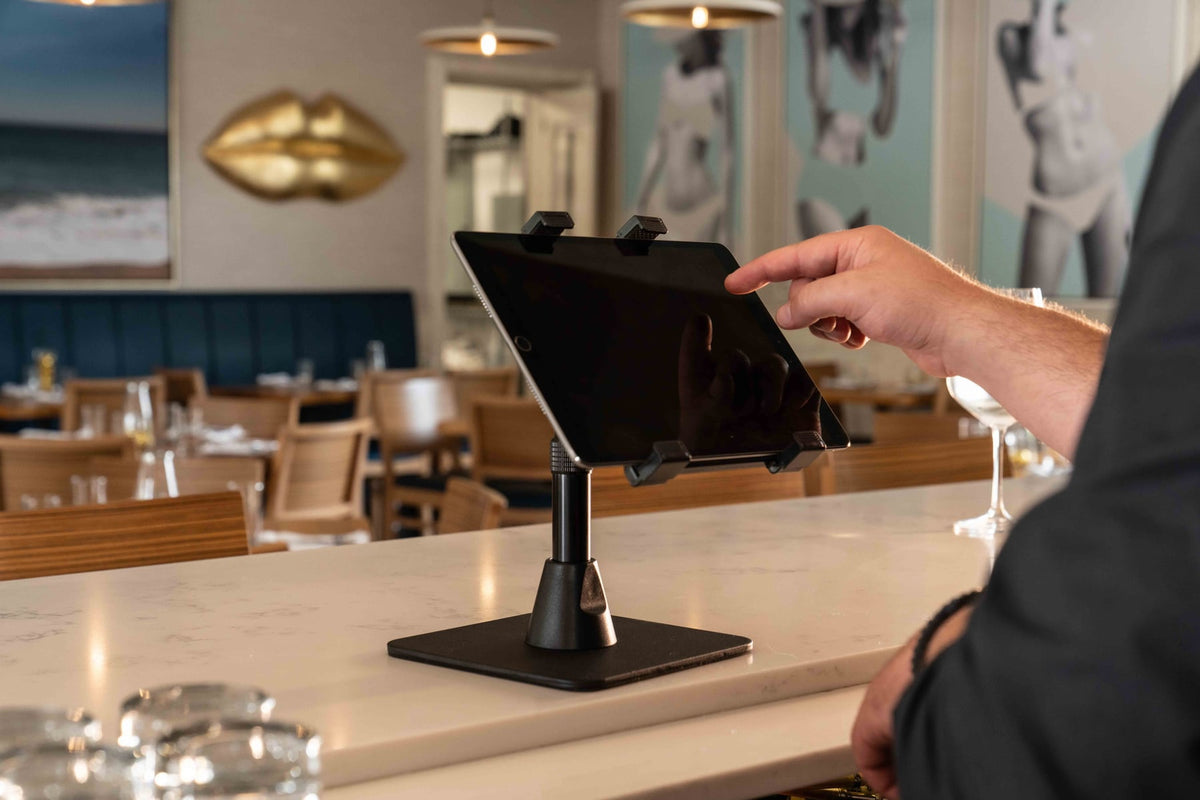 iBOLT device mounting setup in a restaurant workspace