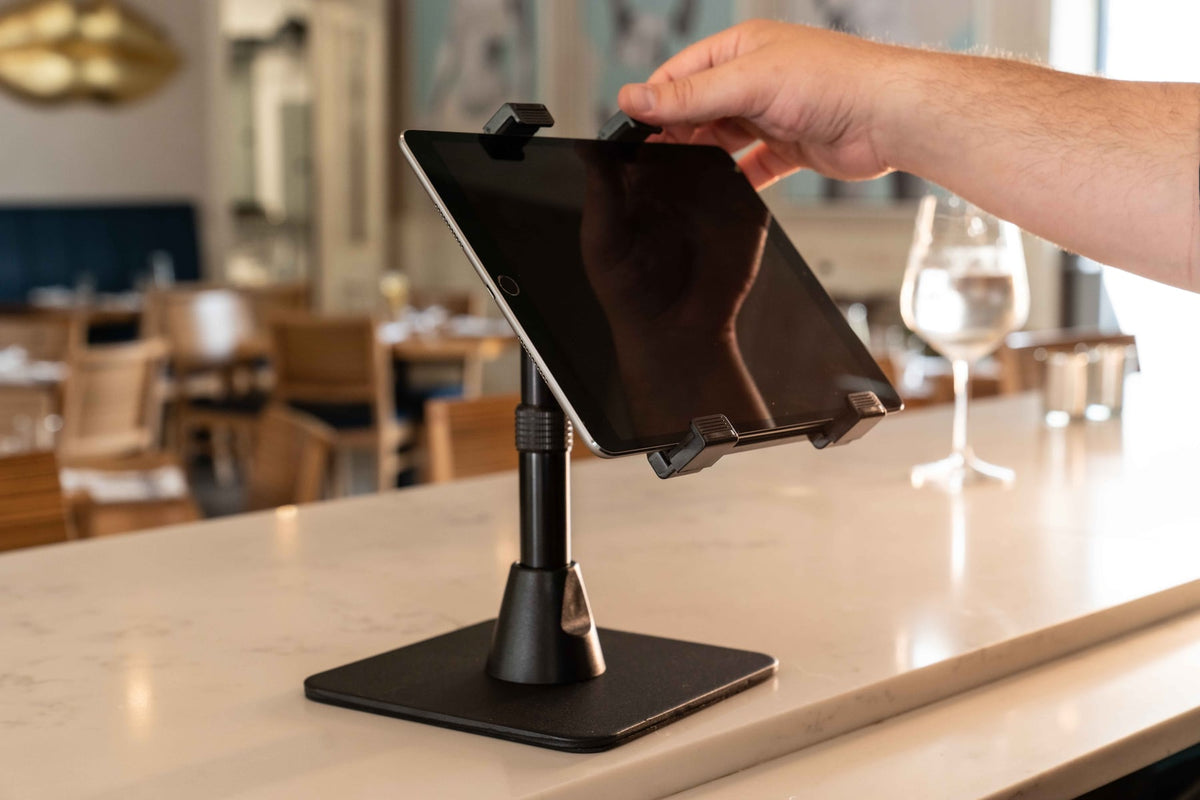 iBOLT device mounting setup in a restaurant workspace