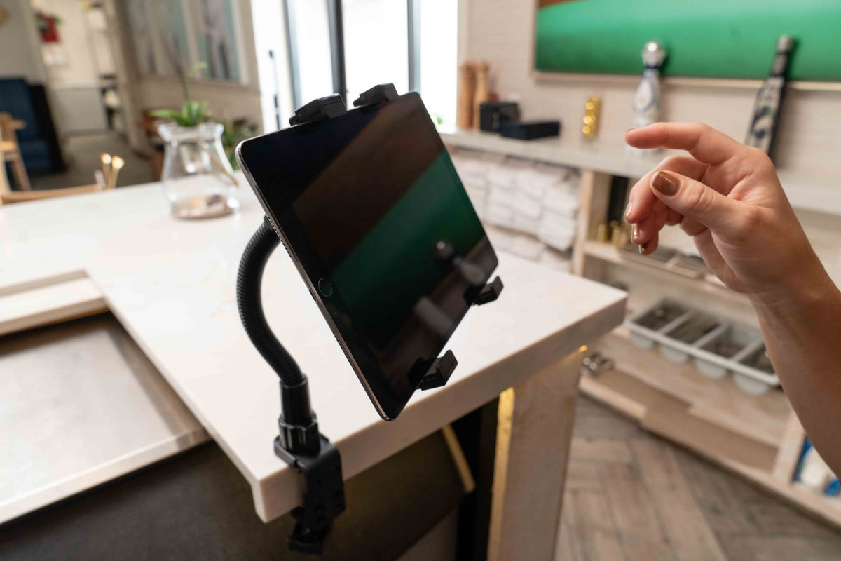 iBOLT device mounting setup in a restaurant workspace
