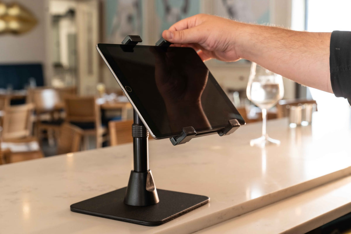 iBOLT device mounting setup in a restaurant workspace