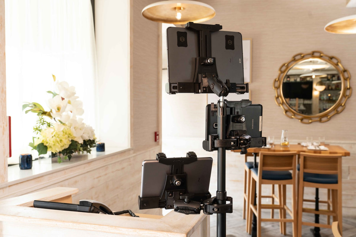 iBOLT device mounting setup in a restaurant workspace