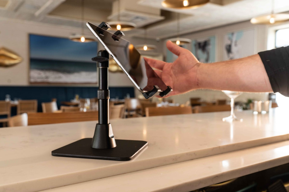 iBOLT device mounting setup in a restaurant workspace