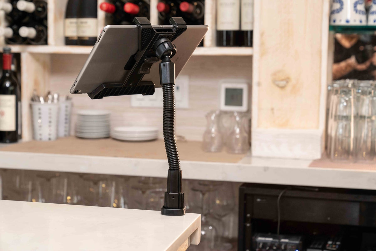 iBOLT device mounting setup in a restaurant workspace