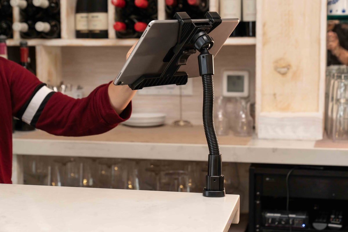iBOLT device mounting setup in a restaurant workspace
