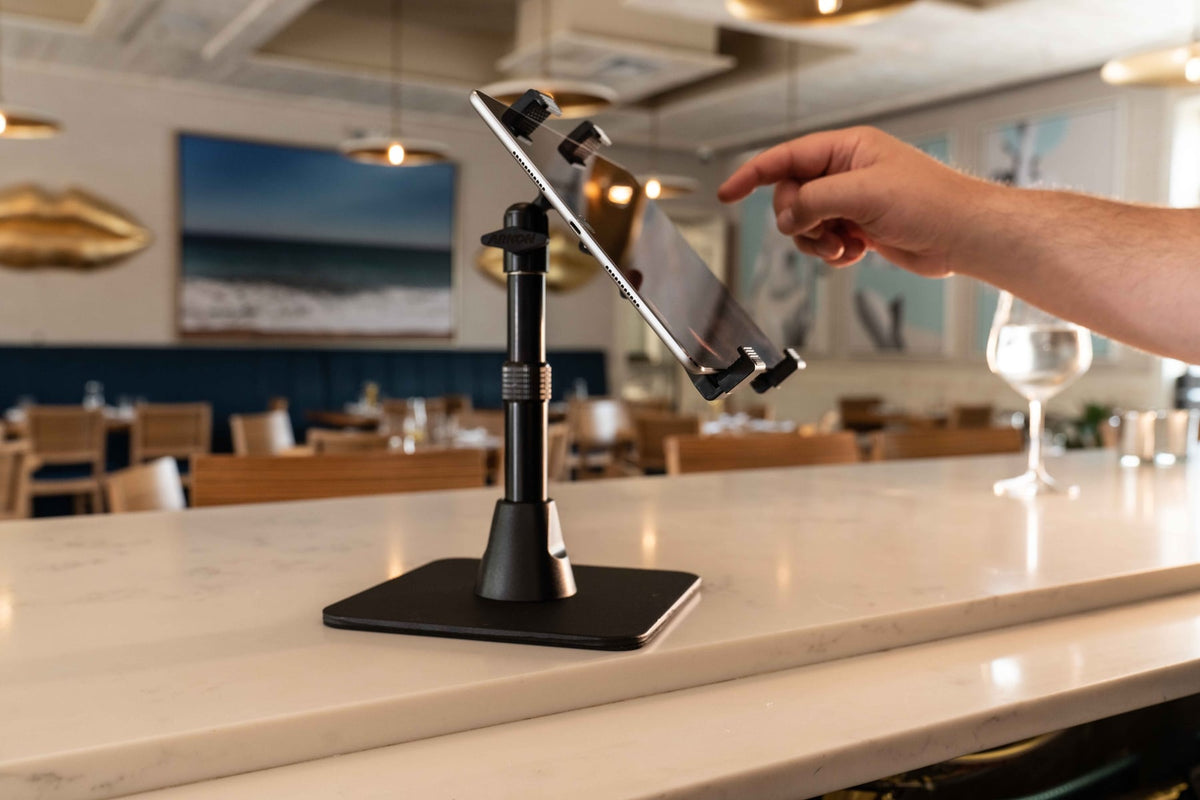 iBOLT device mounting setup in a restaurant workspace