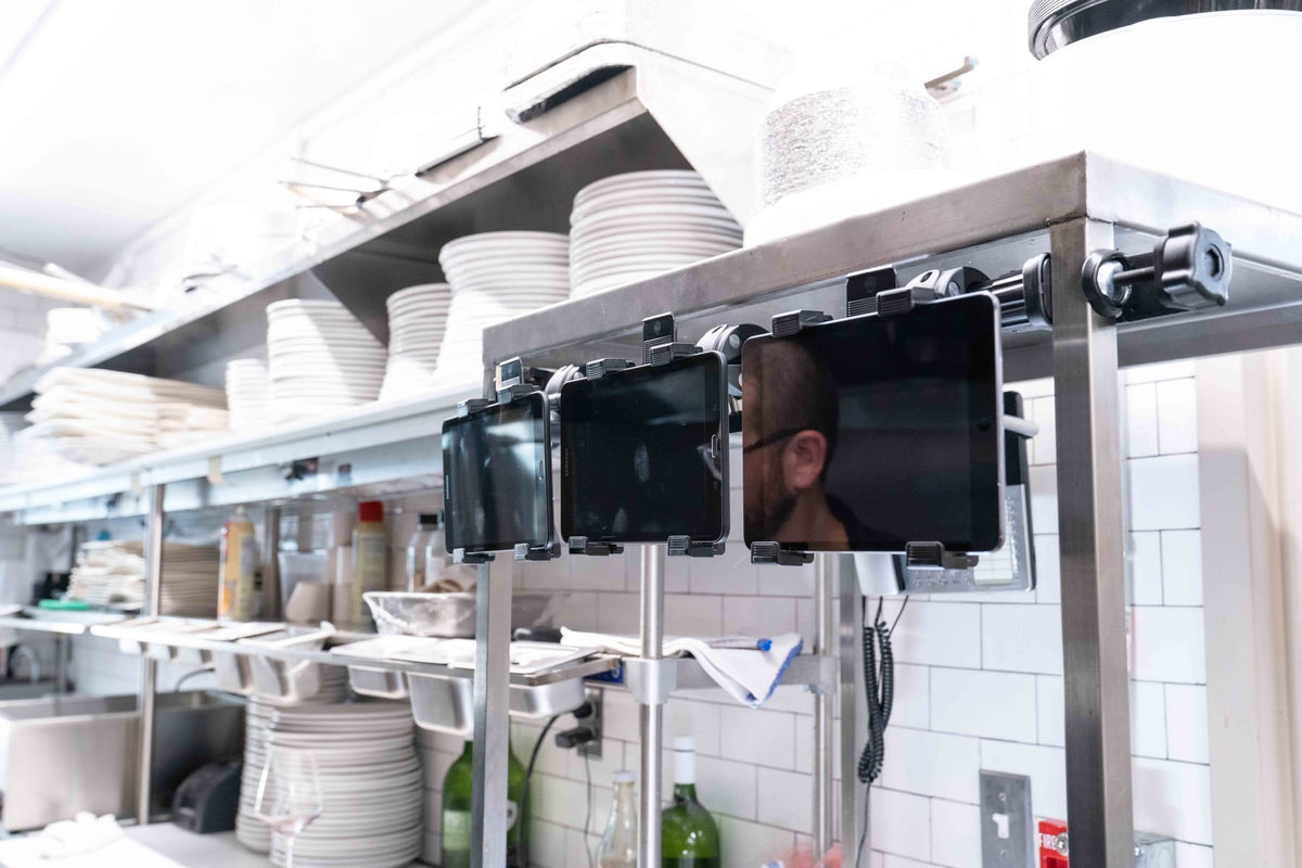 iBOLT device mounting setup in a restaurant workspace