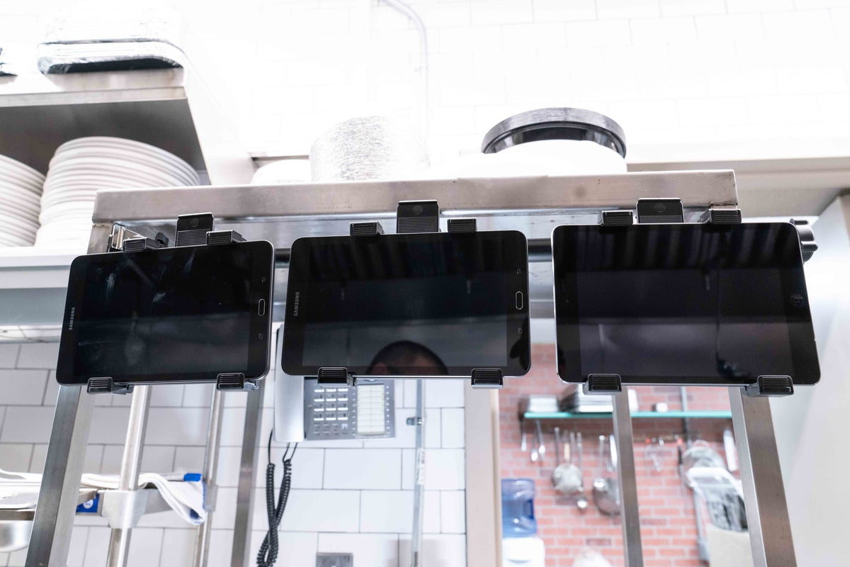 iBOLT device mounting setup in a restaurant workspace